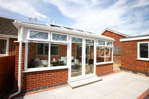 White Edwardian conservatory with diamond leadlight windows