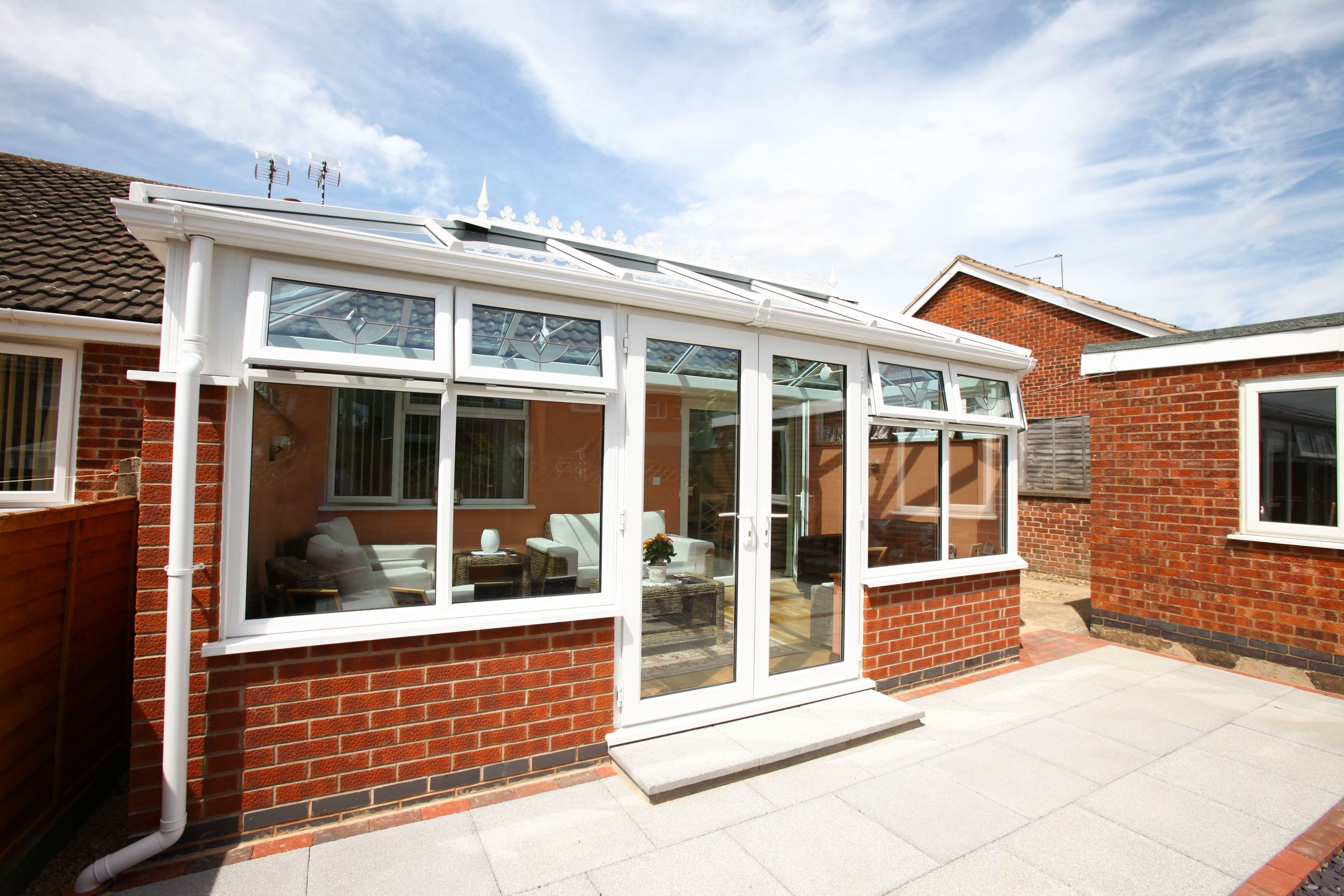 White Edwardian conservatory with diamond leadlight windows